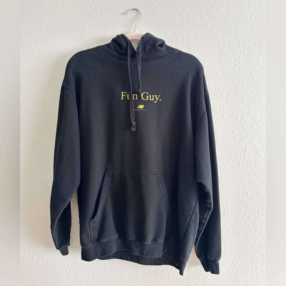 New Balance Black Hoodie with Yellow "Fun Guy." Chest Print